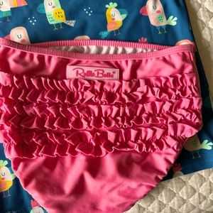 Ruffle Butts two-piece swimsuit. Size 7 children.